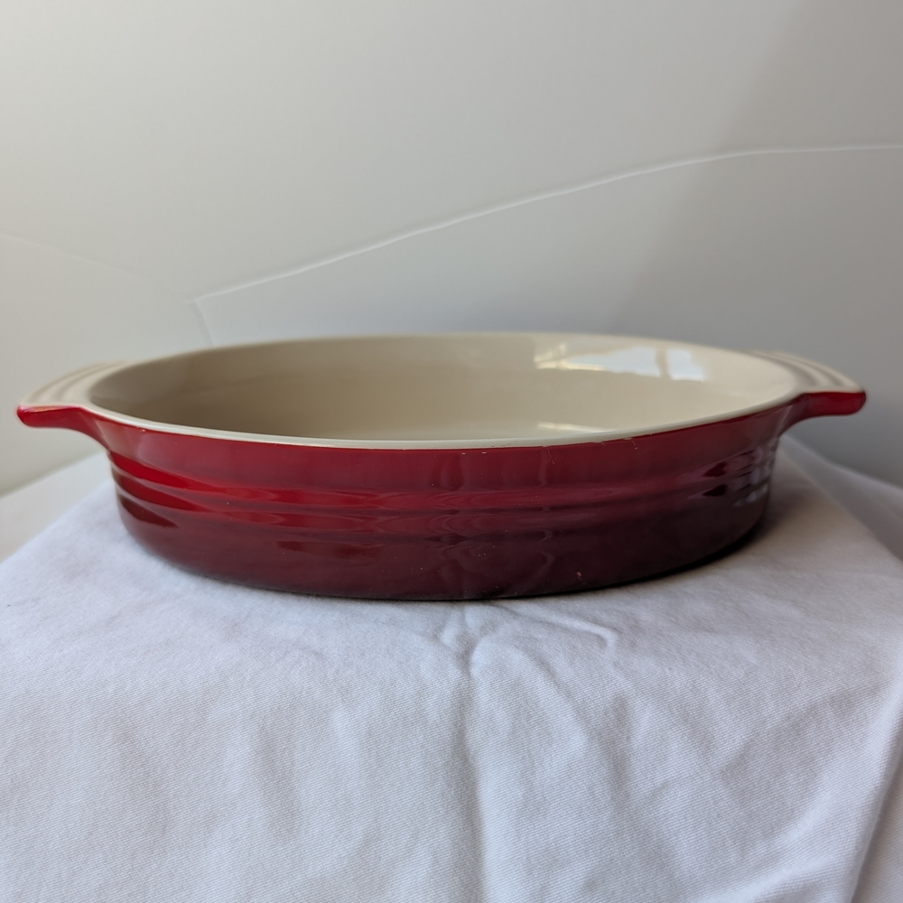 Le Creuset Red Oval Stoneware Baking Dish Tab Handles - Picture 2 of 12